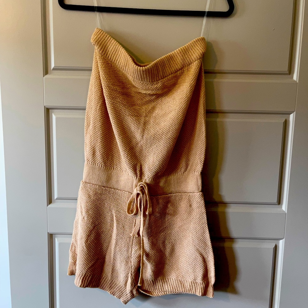 Cream romper with pull string